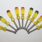 Yellow screwdrivers arranged in a semi-circle